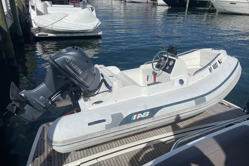 Slide: The Image of Small white motorboat with Yamaha engine docked at marina, Prestige 500S, 2017 model. - 31