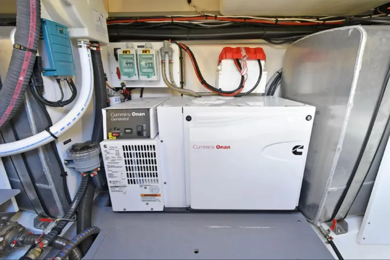 Slide: The Image of Engine room of 2017 Prestige 500S yacht with Cummins Onan generator. - 61