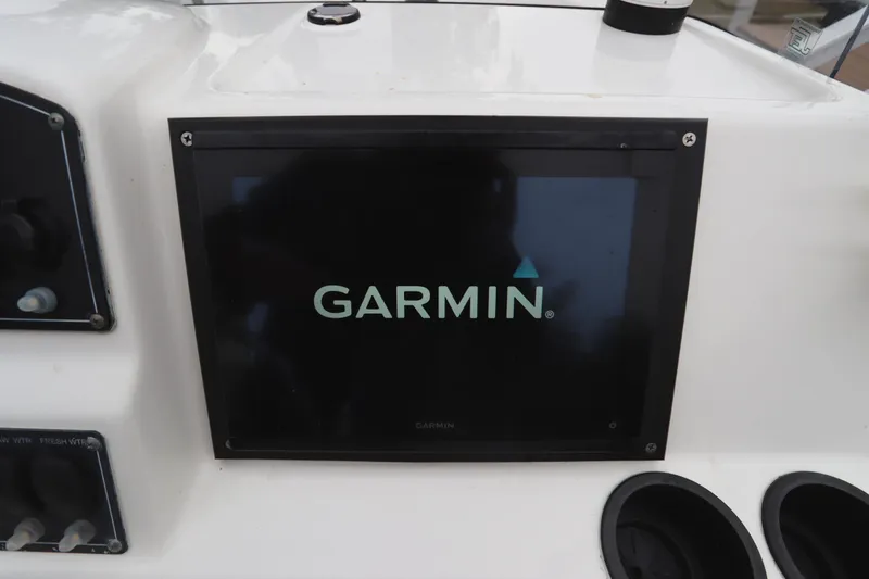 Slide: The Image of Garmin display on 2013 Boston Whaler 210 Montauk boat dashboard. - 12