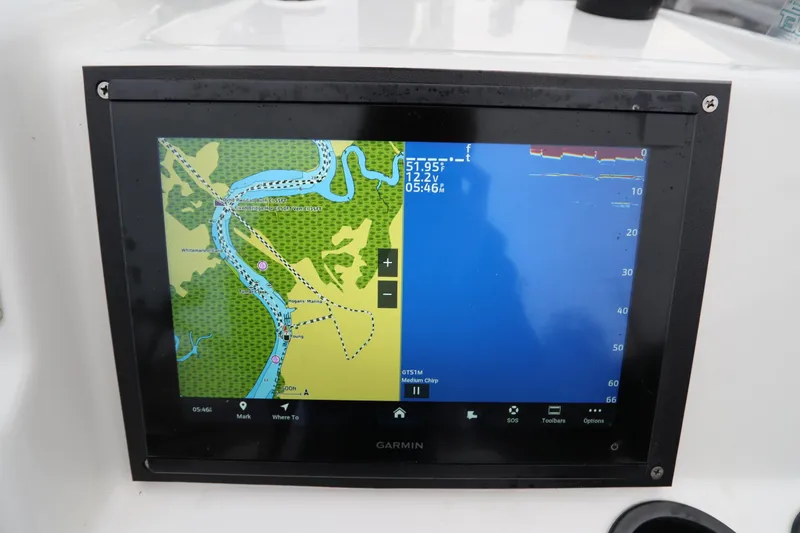Slide: The Image of Garmin navigation display on 2013 Boston Whaler 210 Montauk boat, showing map and sonar. - 13