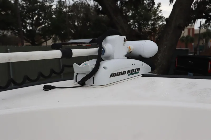 Slide: The Image of Minn Kota trolling motor on 2013 Boston Whaler 210 Montauk boat deck. - 28