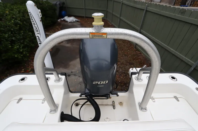 Slide: The Image of 2013 Boston Whaler 210 Montauk with Yamaha 200 engine, viewed from the rear. - 31