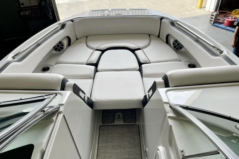 Slide: The Image of 2024 Crownline Eclipse E290 XS boat interior with luxurious seating and modern design. - 11