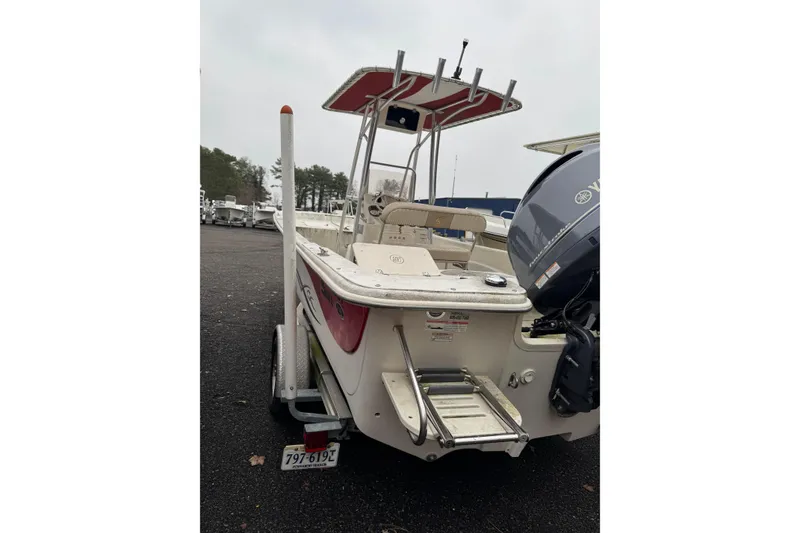 Slide: The Image of 2017 Carolina Skiff 218 DLV boat with Yamaha outboard motor, rear view. - 3