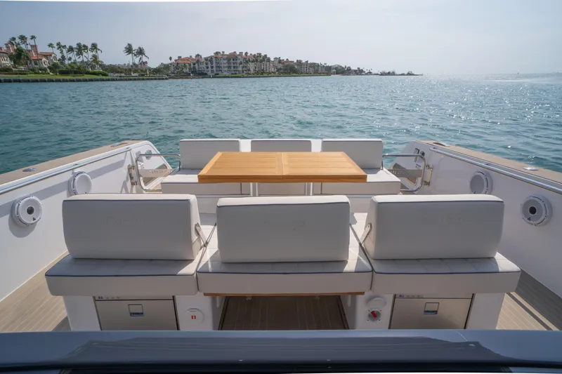 Slide: The Image of 2024 Pardo Yachts P43 cruising on clear blue water, showcasing sleek design and luxury. - 14