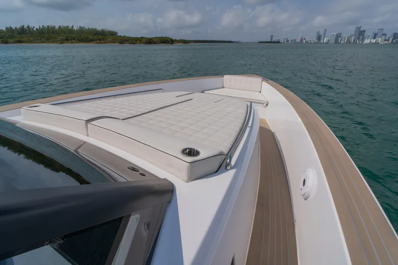 Slide: The Image of 2024 Pardo Yachts P43 cruising on open water, aerial view. - 16