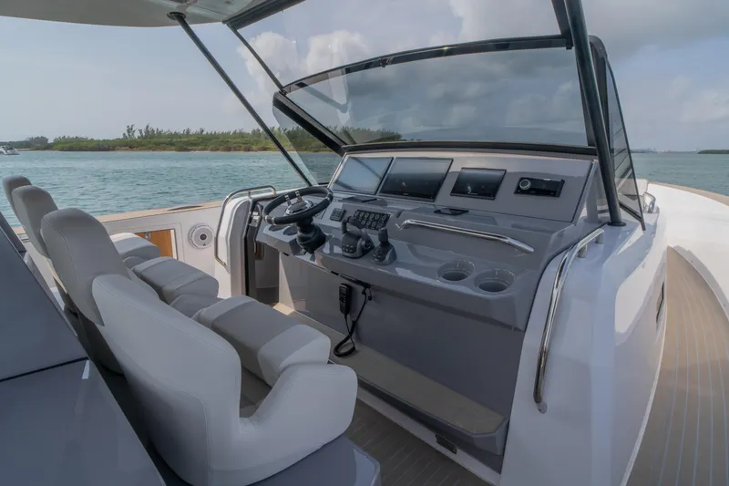 Slide: The Image of 2024 Pardo Yachts P43 deck seating under clear blue sky. - 22