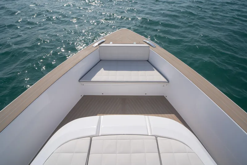 Slide: The Image of Luxurious seating area on 2024 Pardo Yachts P43, with scenic waterfront view. - 18
