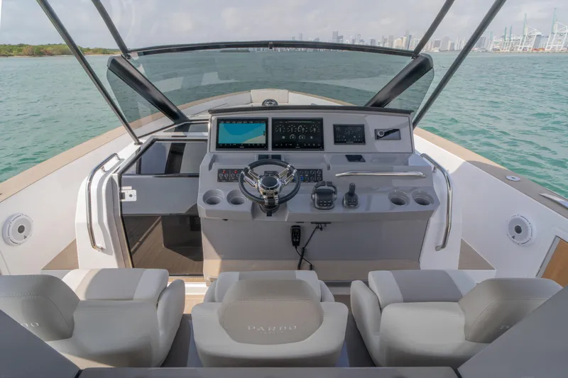 Slide: The Image of 2024 Pardo Yachts P43 luxury yacht on serene water with sunbathing deck. - 23