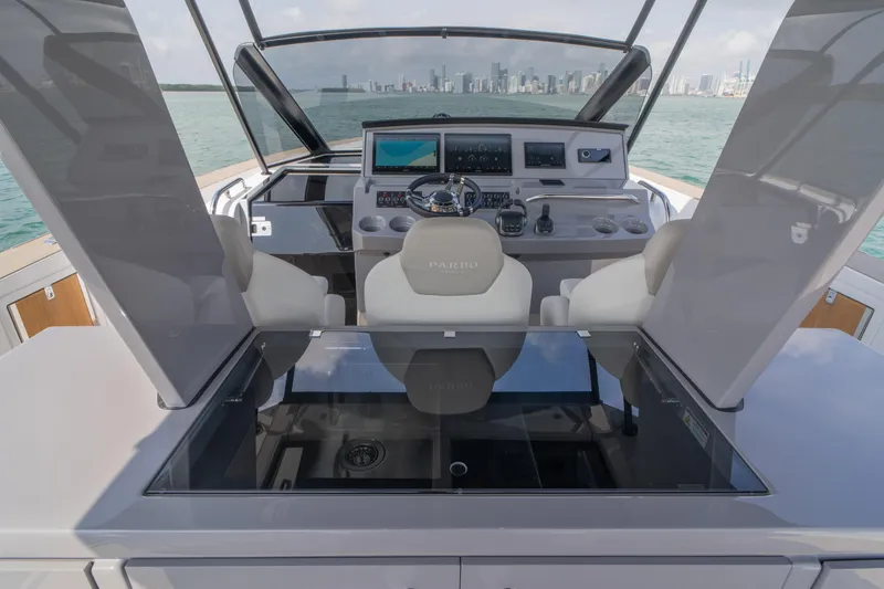 Slide: The Image of 2024 Pardo Yachts P43 helm with modern controls and luxurious seating. - 24