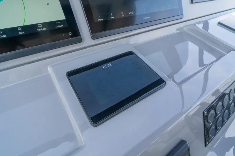 Slide: The Image of 2024 Pardo Yachts P43 luxury yacht with spacious sunbathing area on calm water. - 29