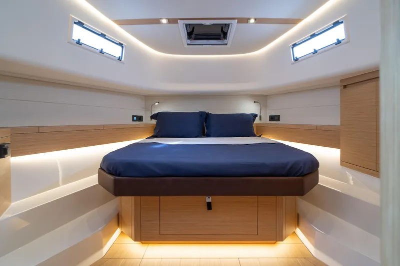 Slide: The Image of 2024 Pardo Yachts P43 helm with modern controls and scenic water view. - 33
