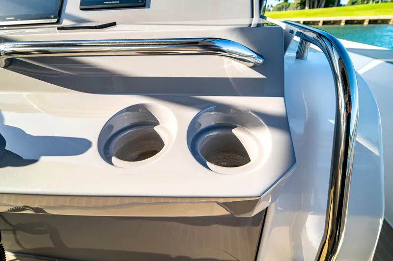 Slide: The Image of Steering wheel and dashboard of 2024 Pardo Yachts P43, featuring modern controls and displays. - 43