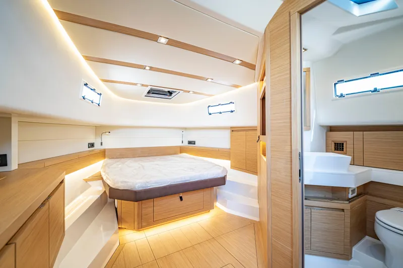 Slide: The Image of 2024 Pardo Yachts P43 cruising on clear blue water. - 52