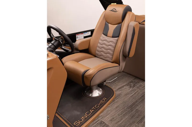 Slide: The Image of Manufacturer Provided Image: Luxurious captain's chair in 2026 SunCatcher Diamond Elite 324 RC boat interior. - 14