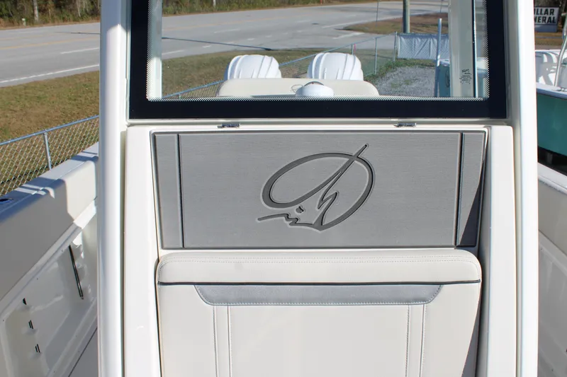 Slide: The Image of 2026 Sailfish 252 CC boat interior with logo detail, featuring sleek design elements. - 31