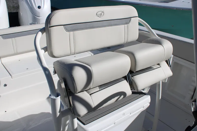 Slide: The Image of 2026 Sailfish 252 CC boat seat with white cushioned design and sturdy frame. - 33
