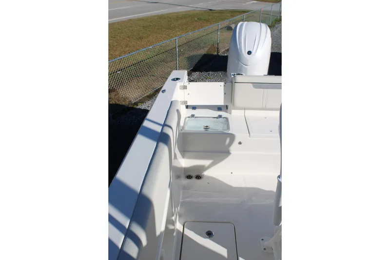 Slide: The Image of 2026 Sailfish 252 CC boat interior with seating and storage compartments. - 34