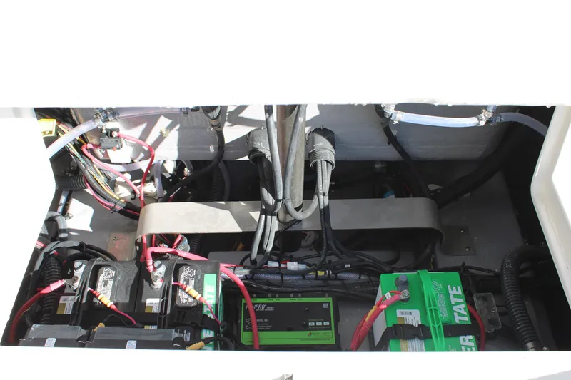 Slide: The Image of Electrical system of 2026 Sailfish 252 CC boat, featuring batteries and wiring. - 36