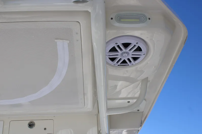 Slide: The Image of 2026 Sailfish 252 CC boat speaker and light detail against blue sky. - 40