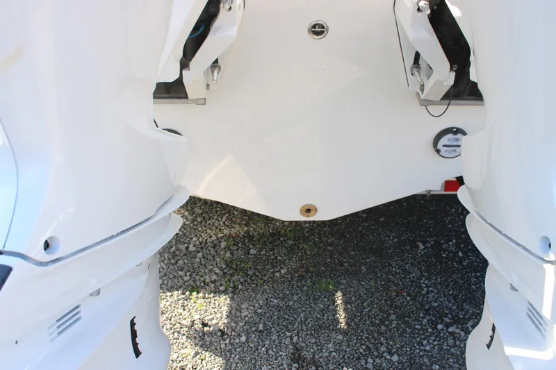 Slide: The Image of 2026 Sailfish 252 CC boat transom with dual outboard motors. - 46