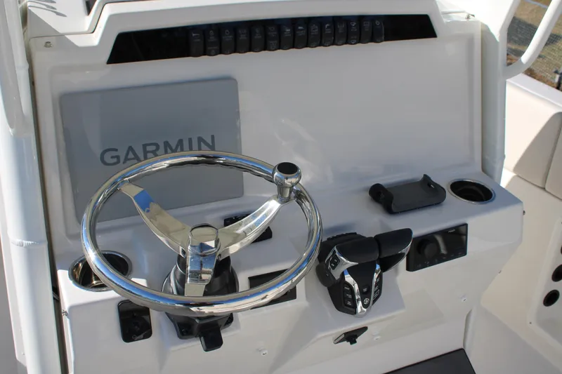 Slide: The Image of Steering console of 2026 Sailfish 252 CC boat with Garmin navigation system. - 5