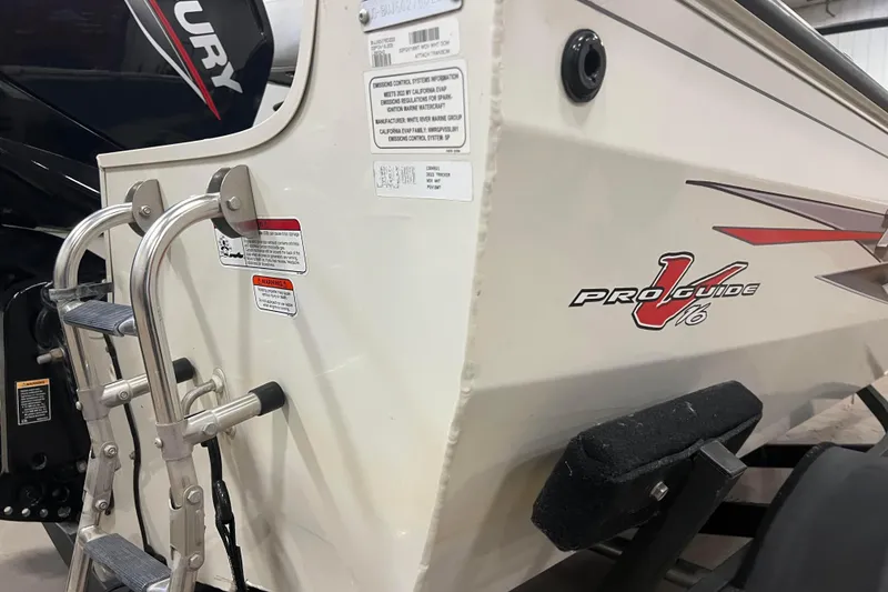 Slide: The Image of 2022 Tracker Pro Guide V-16 WT boat with ladder and Mercury engine. - 44