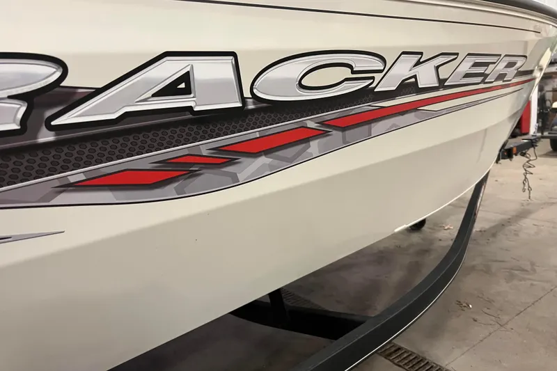 Slide: The Image of 2022 Tracker Pro Guide V-16 WT boat with bold graphics and sleek design. - 46