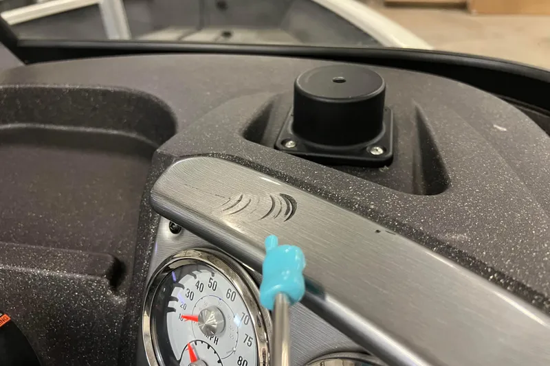 Slide: The Image of Dashboard of 2022 Tracker Pro Guide V-16 WT boat with speedometer and control panel. - 58