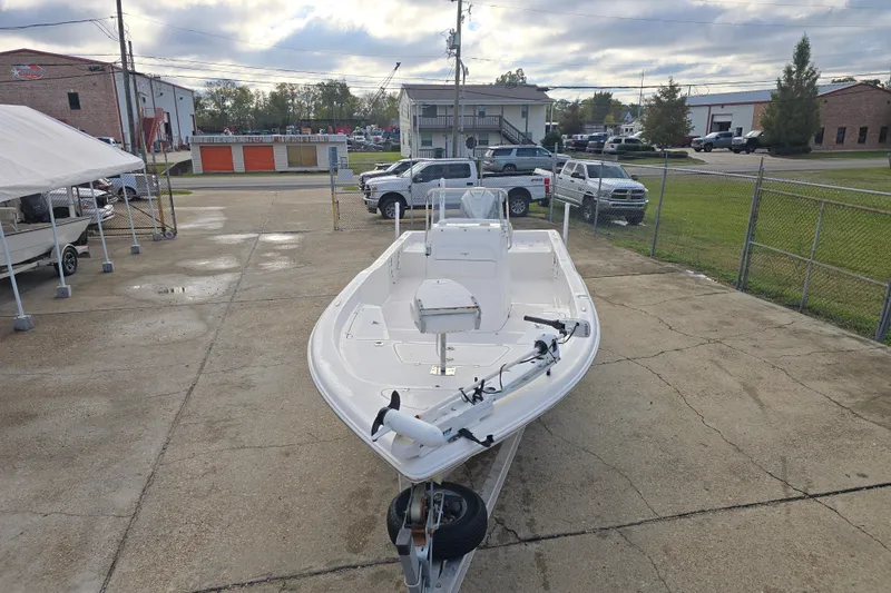 Slide: The Image of 2011 Tidewater 2400 Bay Max boat on trailer in parking lot. - 10
