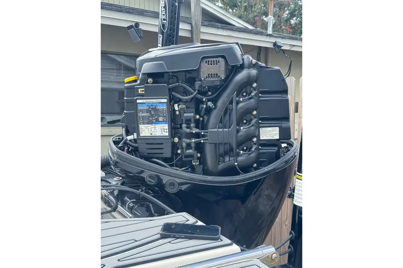 Slide: The Image of 2021 Sea Ray SPX 190 Outboard engine, detailed view of components and wiring. - 15