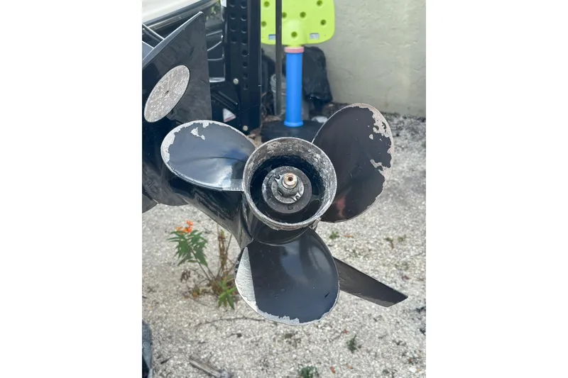 Slide: The Image of Close-up of a worn propeller on a 2021 Sea Ray SPX 190 Outboard boat. - 17