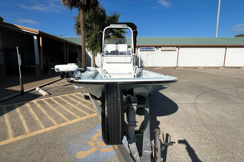 Slide: The Image of 2016 Shallow Sport 21 Sport boat on trailer in parking lot. - 3