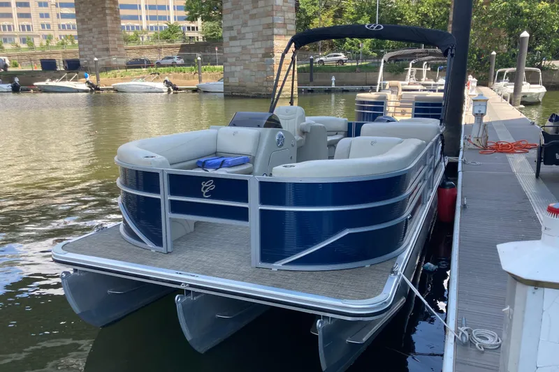 The Image of 2023 Cypress Cay Seabreeze 232 pontoon boat docked at marina. - 1