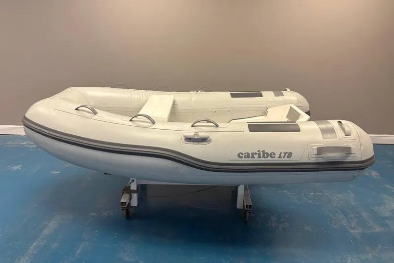 The Image of Inflatable Caribe L-8 boat displayed at AI Boats showroom, 2025 model. - 0