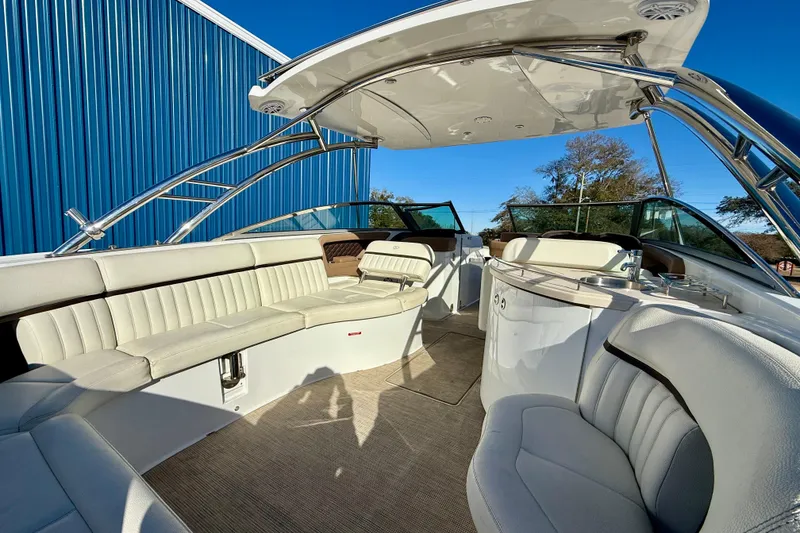 Slide: The Image of Luxurious 2018 Cobalt R35 boat interior with white seating and sleek design. - 4