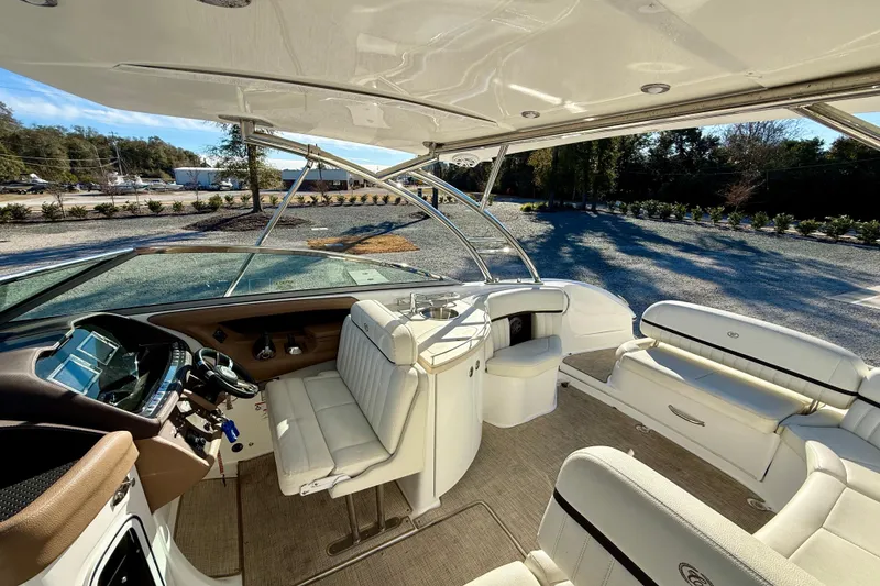 Slide: The Image of Luxurious 2018 Cobalt R35 boat interior with plush seating and modern dashboard. - 9