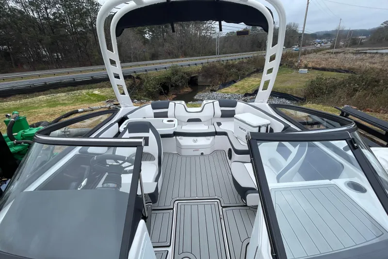 Slide: The Image of 2025 Yamaha Boats 195S interior with sleek seating and modern design. - 13