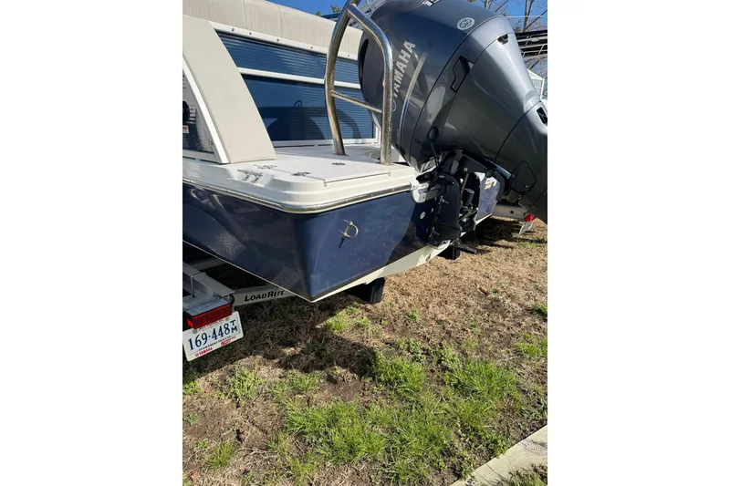Slide: The Image of 2022 Hurricane FunDeck 1960 RE boat with Yamaha motor on trailer. - 11