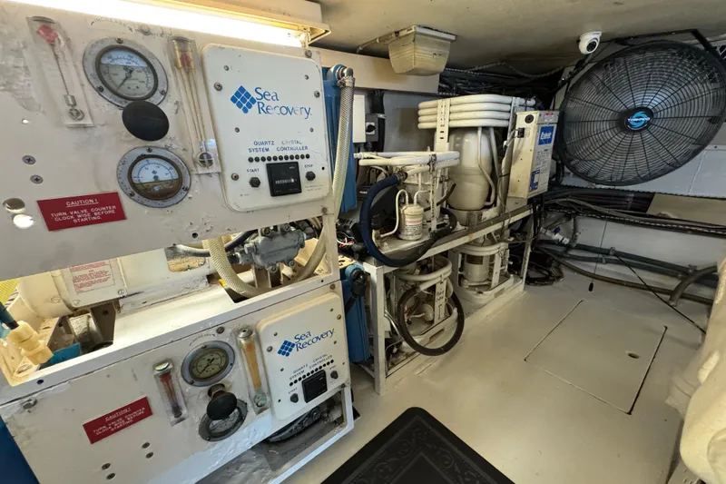 Slide: The Image of Engine room of a 1995 Viking 58 Convertible yacht with Sea Recovery system. - 54
