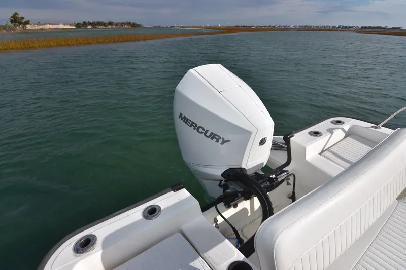 Slide: The Image of 2015 Boston Whaler 190 Montauk with Mercury engine on calm waters. - 6