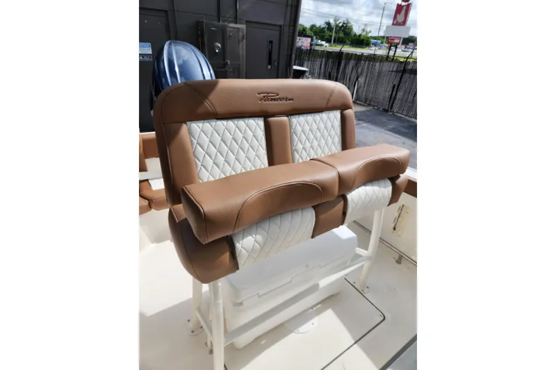 Slide: The Image of 2026 Pioneer 202 Islander boat seat with brown and white diamond-patterned upholstery. - 5