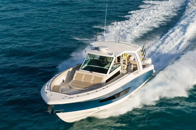 Slide: The Image of Interior view of a 2019 Boston Whaler 420 Outrage boat at the dock. - 7