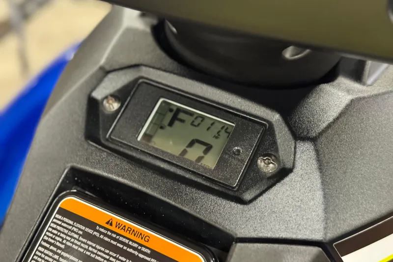 Slide: The Image of Close-up of 2019 Yamaha WaveRunner EXR dashboard display and warning label. - 12