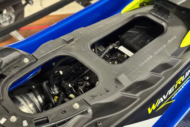 Slide: The Image of 2019 Yamaha WaveRunner EXR engine compartment, showcasing internal components and design. - 14