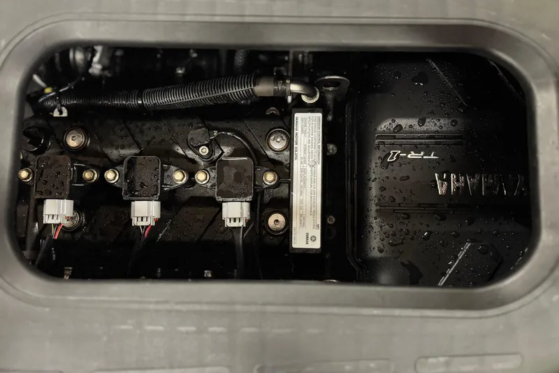 Slide: The Image of 2019 Yamaha WaveRunner EXR engine compartment with visible components and wiring. - 15