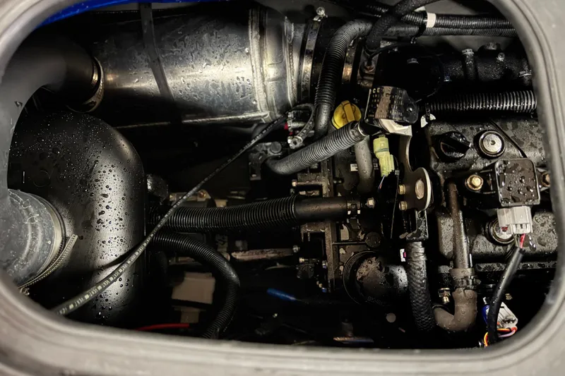 Slide: The Image of 2019 Yamaha WaveRunner EXR engine compartment with visible components and wiring. - 16