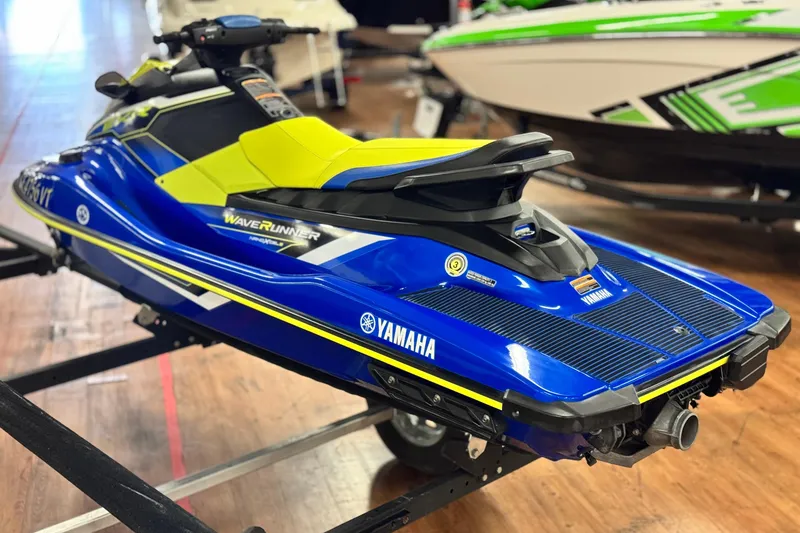 Slide: The Image of 2019 Yamaha WaveRunner EXR in blue and yellow on display indoors. - 4