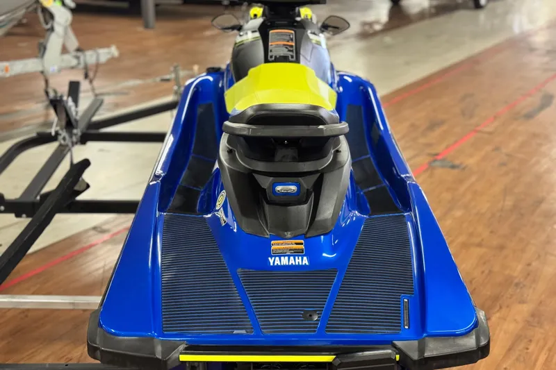 Slide: The Image of 2019 Yamaha WaveRunner EXR in blue and yellow on a trailer indoors. - 6