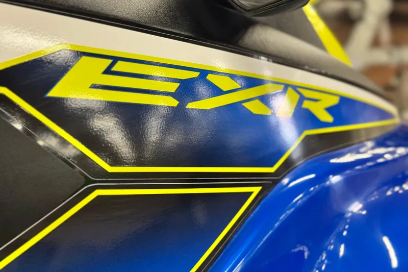 Slide: The Image of Close-up of 2019 Yamaha WaveRunner EXR logo on blue and yellow body. - 9
